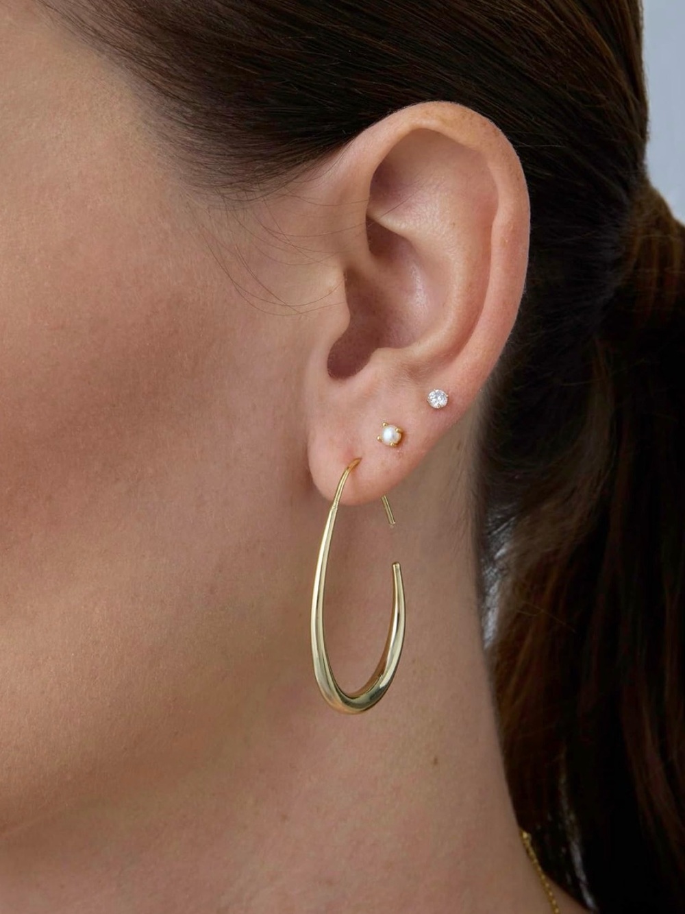 Adornia Polished Gold Curved Wire Hoop Earrings for Women - Picture 4 of 7